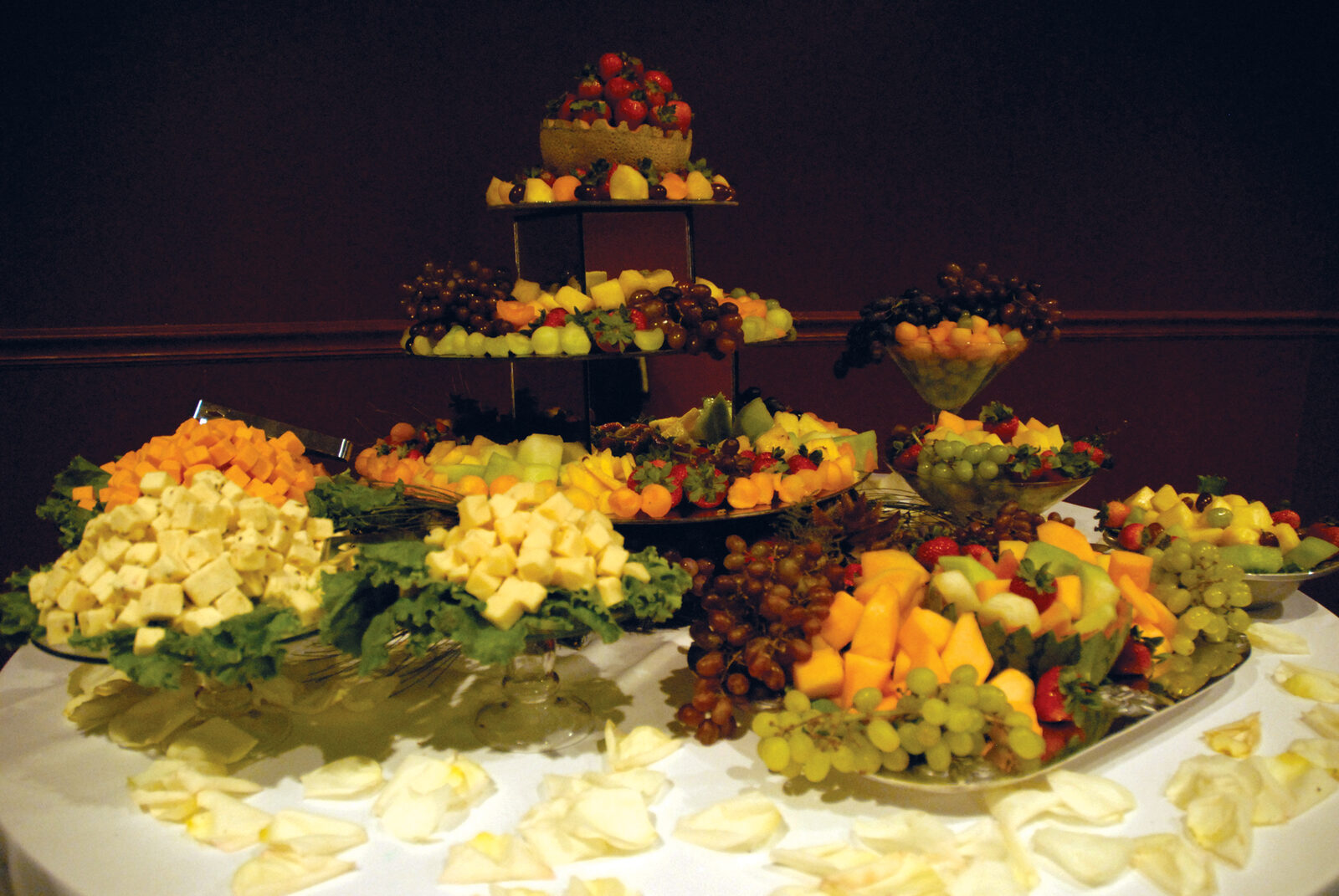 Fresh seasonal fruit display with dip